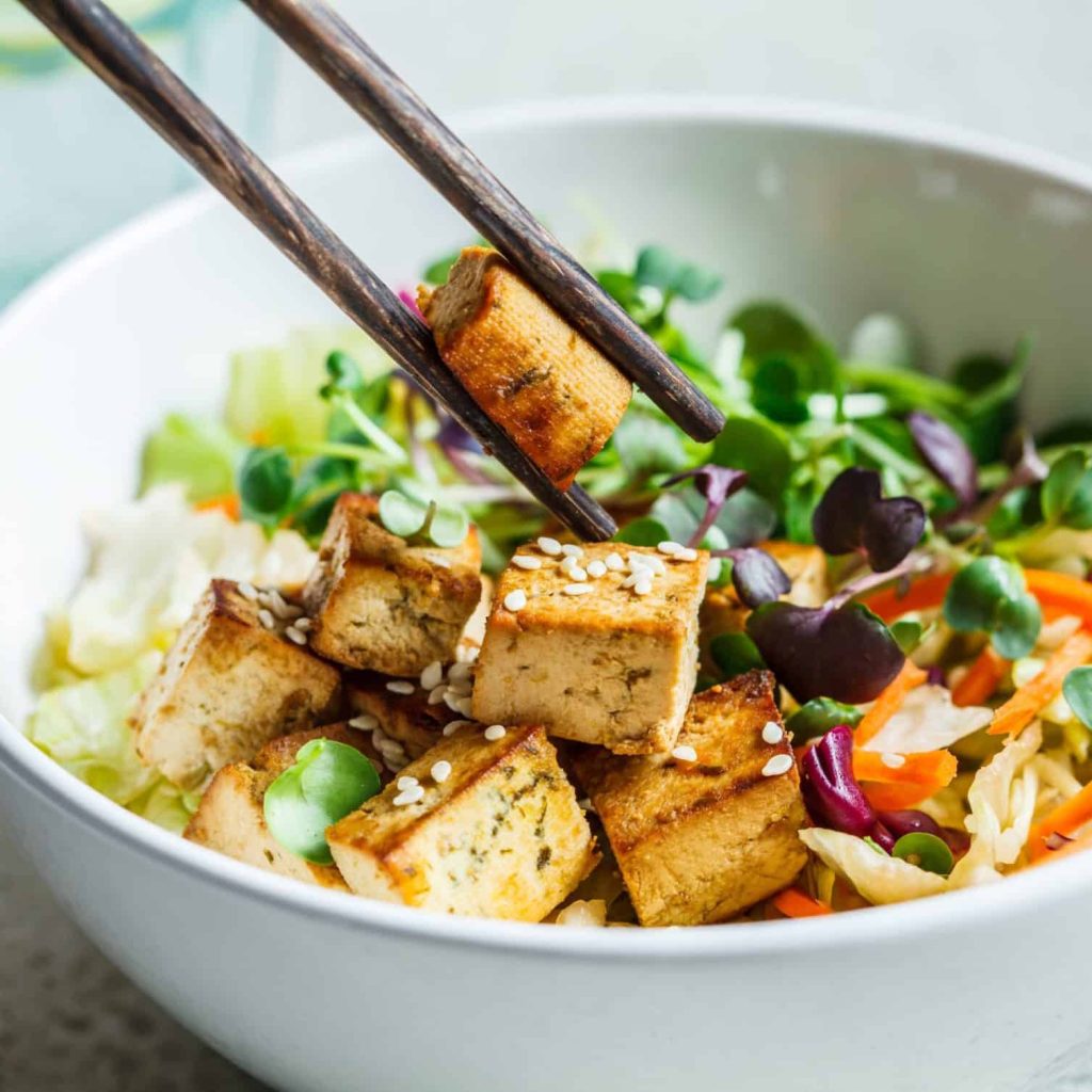 Fried,Tofu,Salad,With,Sprouts,And,Sesame,Seeds,In,A